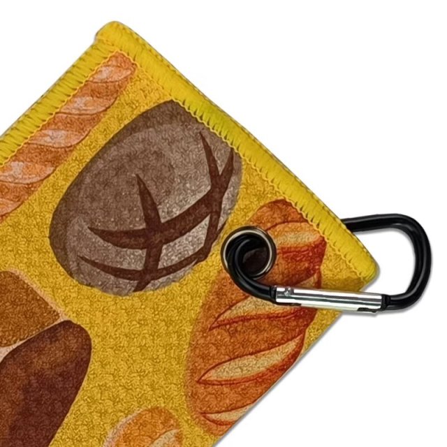 Golf towel with carabiner clip and reinforced metal grommet