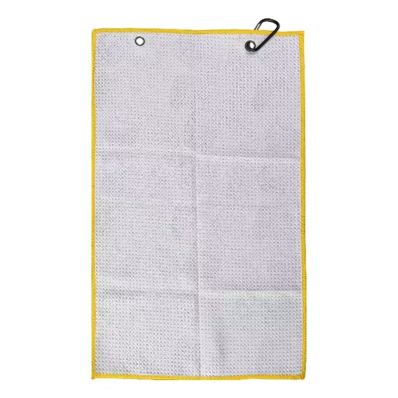 Textured golf towel reverse with dual metal grommets and clip