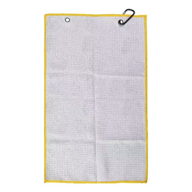 Textured golf towel reverse with dual metal grommets and clip