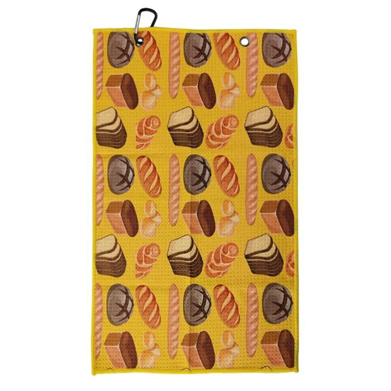 Custom pattern golf towel with yellow bakery print and clip
