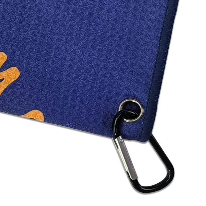 Golf towel with carabiner clip and reinforced metal grommet