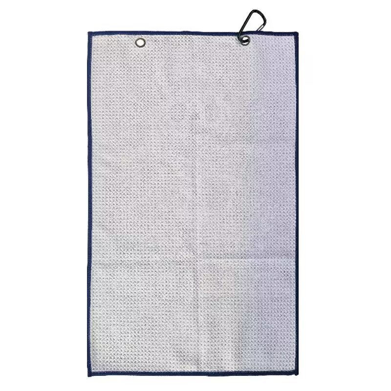 Textured golf towel reverse with dual metal grommets and clip