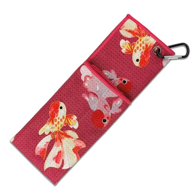 Printed golf bag towel with fish pattern and carabiner clip