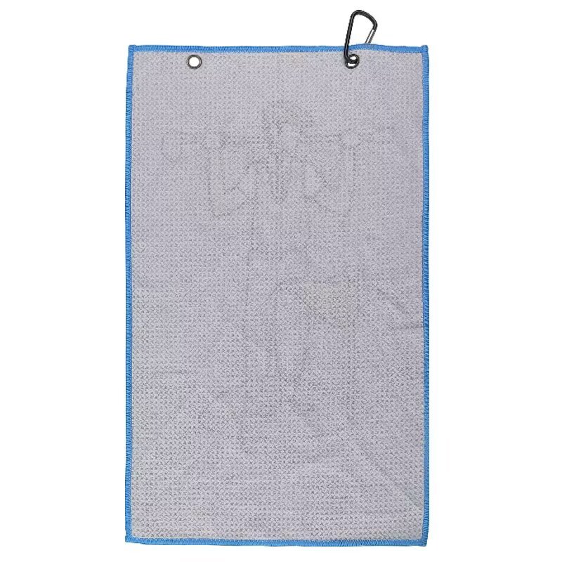 Textured golf towel reverse with dual metal grommets and clip