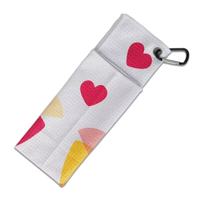 Golf towel for women folded with carabiner for golf bag