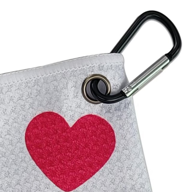 Golf towel with carabiner clip and reinforced metal grommet