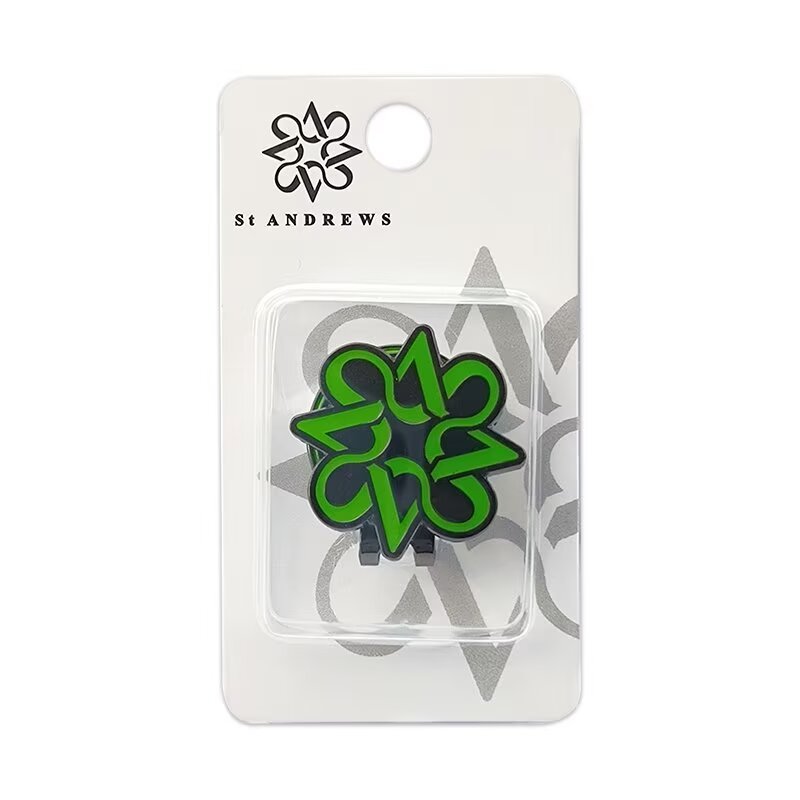 Custom magnetic golf ball marker hat clip with green logo design and retail card packaging