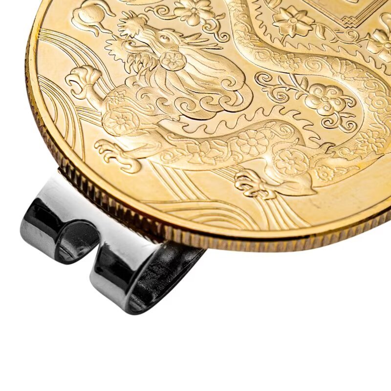 Gold tone metal golf ball marker coin with magnetic hat clip detail