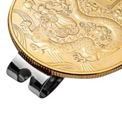 Gold tone metal golf ball marker coin with magnetic hat clip detail