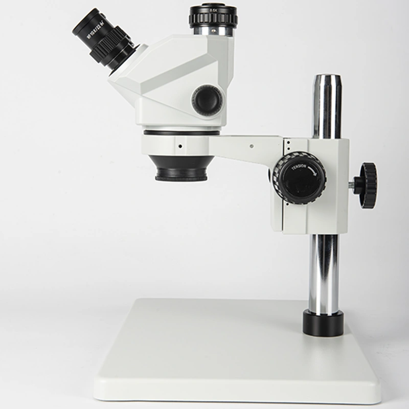 Vertical camera port and 0.5X CTV adapter on the microscope head