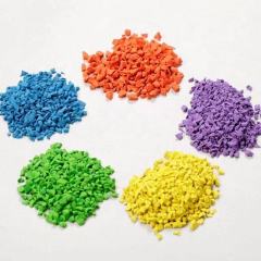 Close-up of durable, abrasive-resistant colored EPDM rubber granules for high-traffic surfaces.