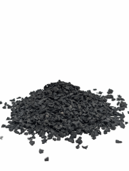 Close-up of 2-5mm SBR rubber granules showing the uniform size for sports flooring.