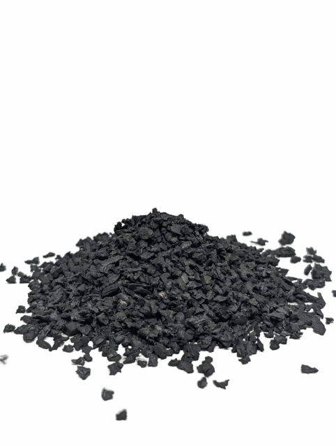 Close-up of 2-5mm SBR rubber granules showing the uniform size for sports flooring.