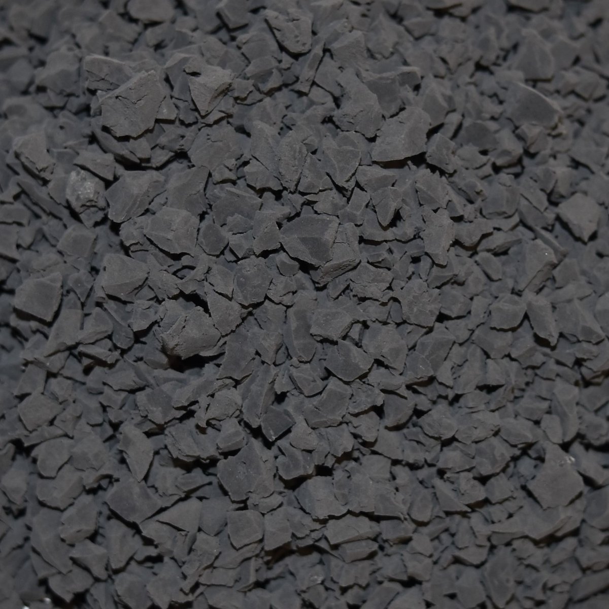Different sizes of EPDM granules ranging from 0.5mm to 5.0mm for various applications.