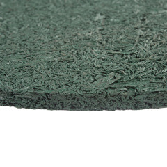 Close-up showing high friction coefficient and wear-resistant texture of rubber mulch.