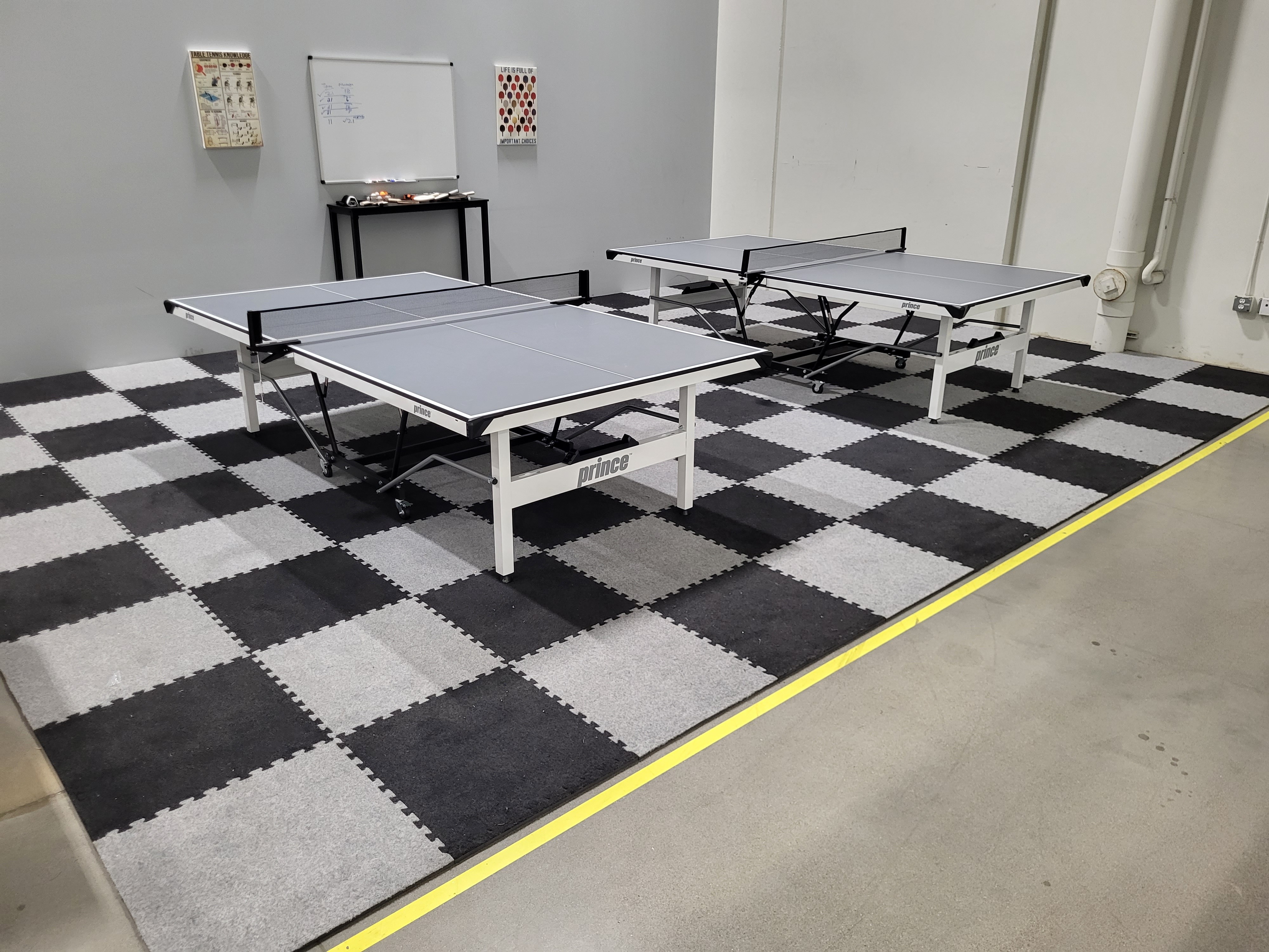 Royal interlocking carpet tiles installed in a trade show booth for anti-fatigue comfort.