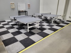 Royal interlocking carpet tiles installed in a trade show booth for anti-fatigue comfort.