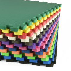 Premium 5/8 inch foam mats used as anti-fatigue flooring in a home woodworking shop.