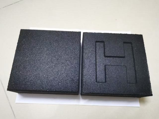 Sound absorbent rubber flooring used in a commercial cinema to dampen vibration and audio leaks.