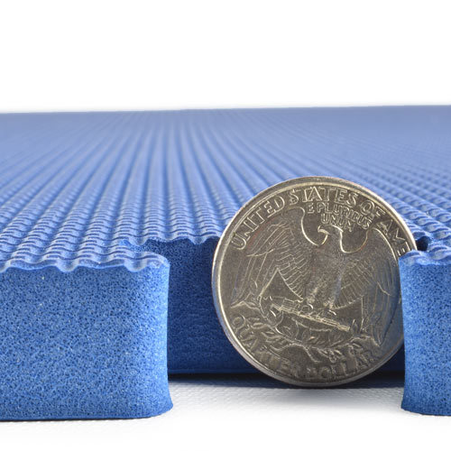 Close-up of tight-fitting interlocking puzzle edges for easy DIY foam mat installation.