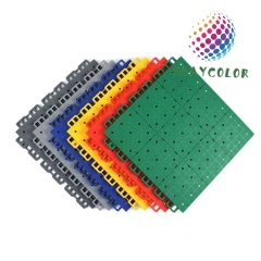 Close-up of the interlocking edge system for easy tool-free tile installation.