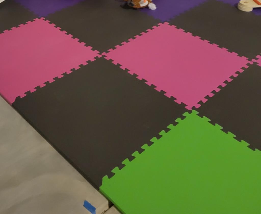 5/8 inch cushioned foam tiles providing joint protection for home gym workouts.