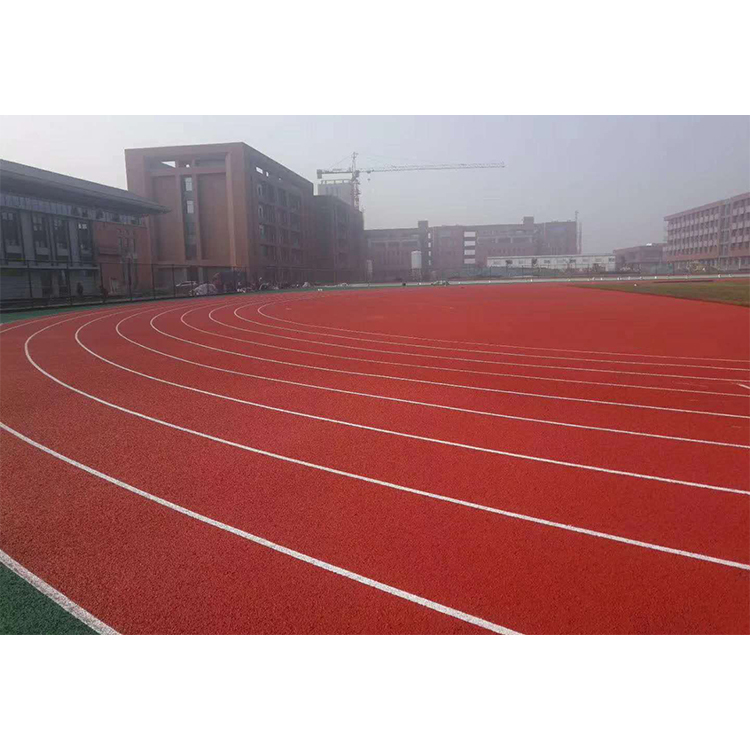 Technical diagram showing the multi-layer construction of the sandwich system running track.