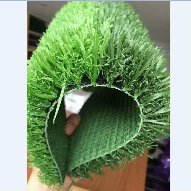 Close-up of realistic synthetic garden turf with natural green color and soft texture.