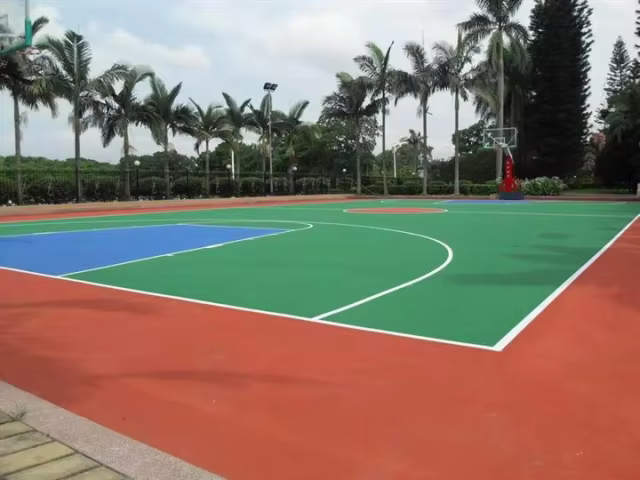 Durable and hygienic seamless outdoor tennis court installation using Silicon PU.