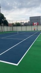 High-performance seamless tennis court surface designed for comfort and safety.