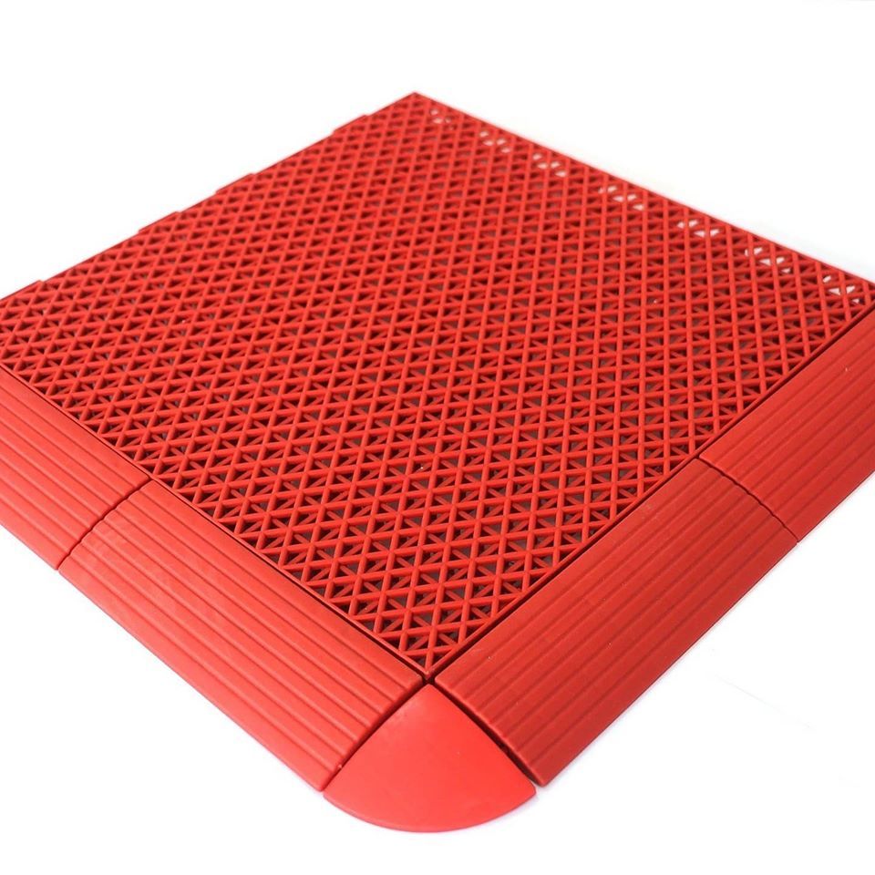 Multi-use PP interlocking tiles showing 10-year UV stability and weather resistance.