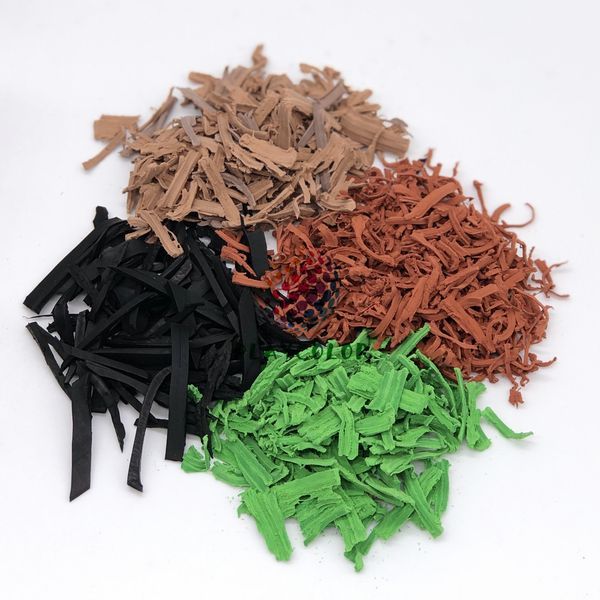 Various custom color options for EPDM rubber mulch including red, green, and blue.