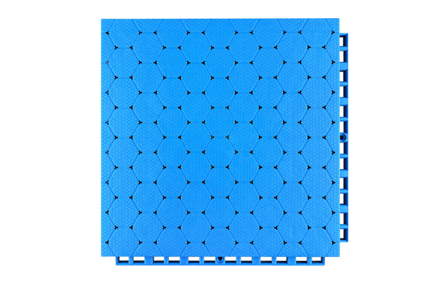 Underside view of a 305×305×16mm TPR sports flooring tile showing the octagonal bottom support structure and integrated two-way drainage channel geometry, illustrating the load distribution footprint and bidirectional water runoff path for outdoor sports surface installation.