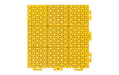 Installed 305×305×16mm double-layer hexagonal polypropylene interlocking playground tiles on an outdoor primary school or kindergarten playground surface, showing full-coverage modular installation, consistent matte-texture surface, and uniform soft-connection joint alignment across the installed area.