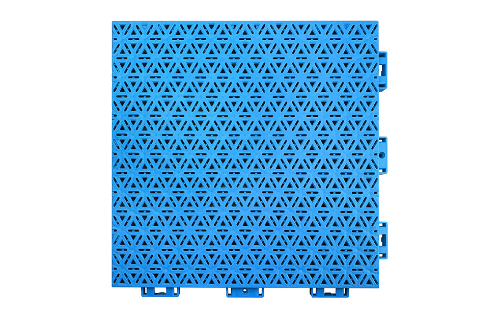 Top-down view of a 319×319×16mm three-layer hexagonal polypropylene interlocking playground tile showing the pearl pattern matte anti-slip surface, designed for superior multi-directional grip on primary school, secondary school, and kindergarten outdoor playground surfaces.