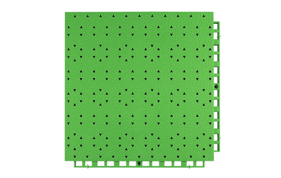 Top-down view of a 305×305×13mm thermoplastic rubber outdoor safety flooring tile showing the gem-textured surface pattern with triangular row drainage holes and auxiliary drainage grooves, designed for anti-slip grip and rapid water evacuation on kindergarten and nursery school outdoor activity surfaces.