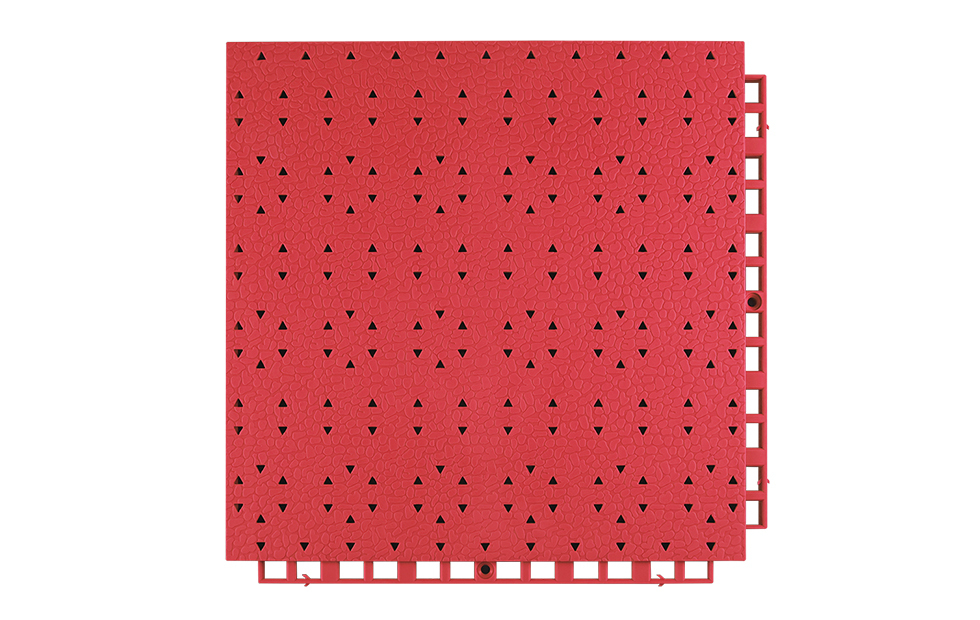 Underside view of a 305×305×13mm TPR kindergarten safety flooring tile showing the cylindrical ring bottom structure and cross rib support feet, which distribute fall impact loads and maintain substrate clearance for drainage and ventilation in outdoor early-childhood facility installations.