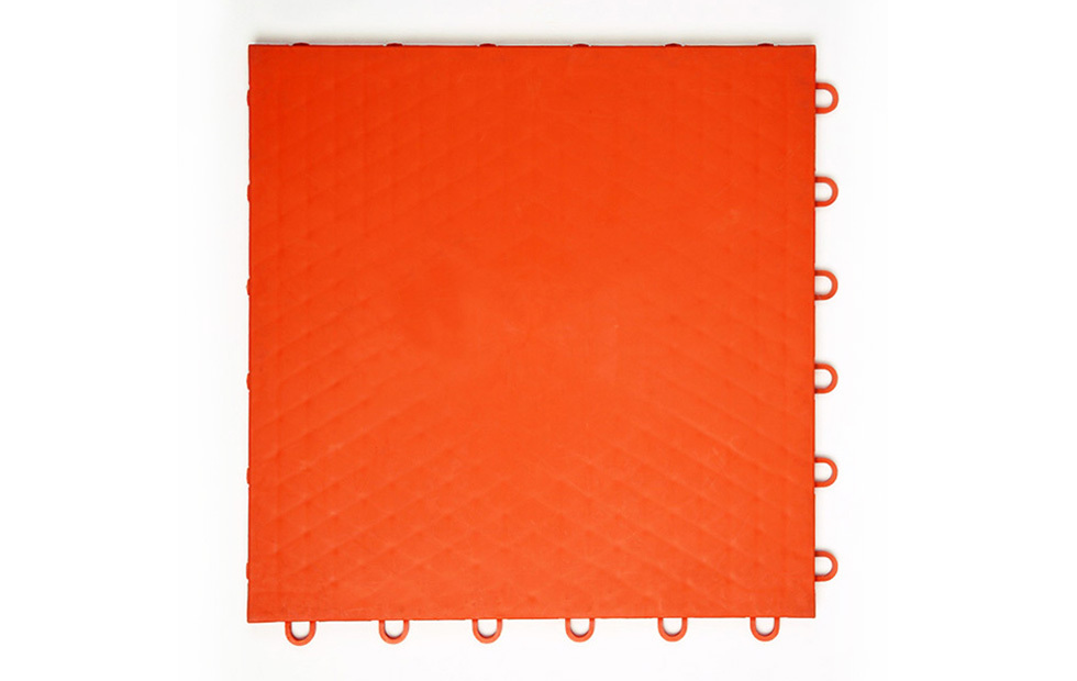 Top-down view of a 305×305×13mm PP rubber composite indoor sports tile showing the solid polypropylene surface layer with anti-slip texture, designed for court sports grip performance on basketball, volleyball, and badminton court installations where ankle injury reduction is a facility procurement requirement.