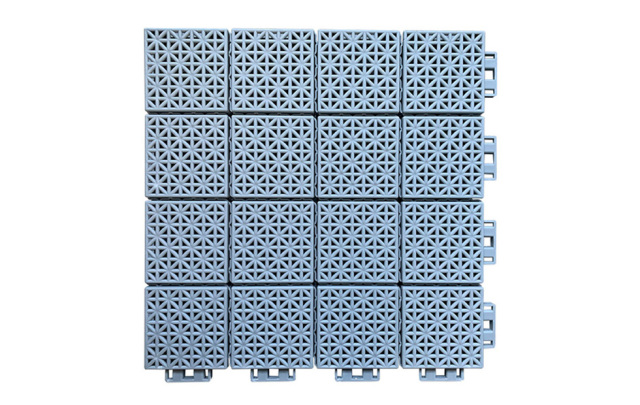 Close-up of the new soft connection design perimeter joint between two adjacent 300×300×13mm PP sports tiles, showing the compliant interlocking connection geometry that solves thermal expansion and contraction in large-area basketball court and badminton court paving without joint separation or surface buckling.