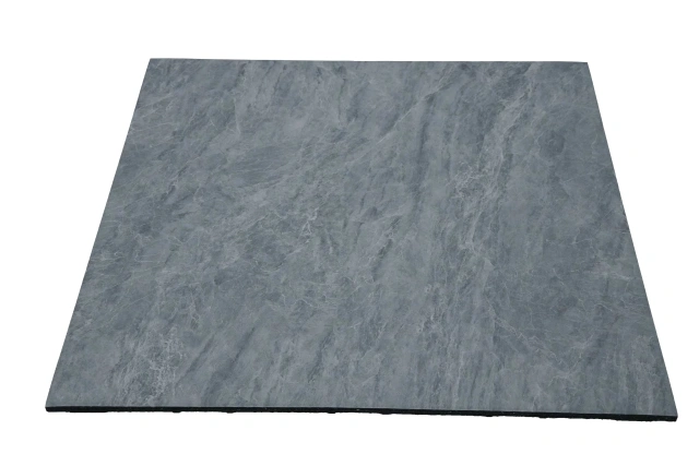 Copolymer surface rubber floor tile showing compact anti-skid textured top surface, square tile format, and customizable pattern detail for gym flooring and commercial anti-fall protection applications