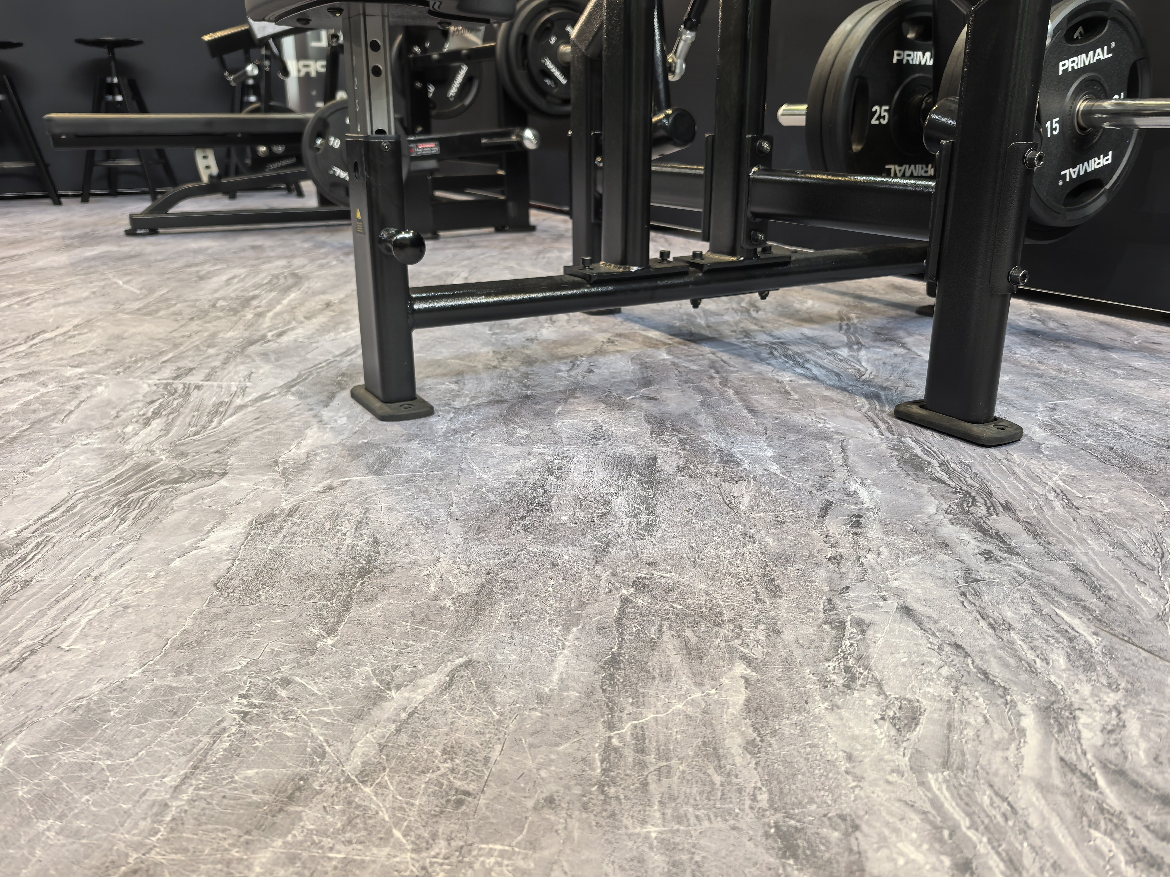 Copolymer surface rubber floor tile in commercial flooring project deployment showing installed tile array, compact surface appearance, customizable pattern design, and integration with commercial facility floor area