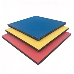 Outdoor rubber flooring mat in modular 500×500mm and 1000×1000mm square formats, showing dual-layer composite construction with solid rubber surface layer and SBR granule base, available in 15mm to 50mm thickness configurations for playground, municipal pathway, and recreational facility procurement.