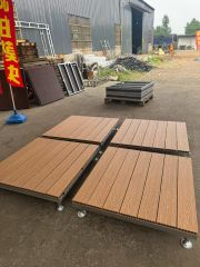 Close-up of WPC composite decking surface texture on modular platform