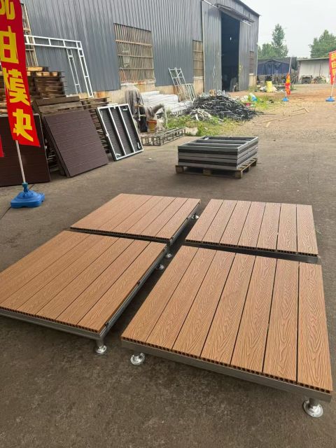 Close-up of WPC composite decking surface texture on modular platform