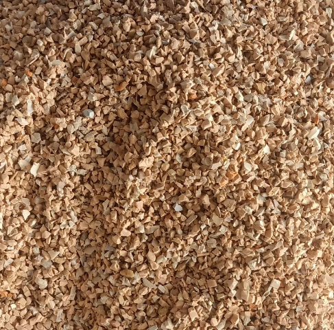 Close-up of SBR crumb rubber granules showing black granule texture