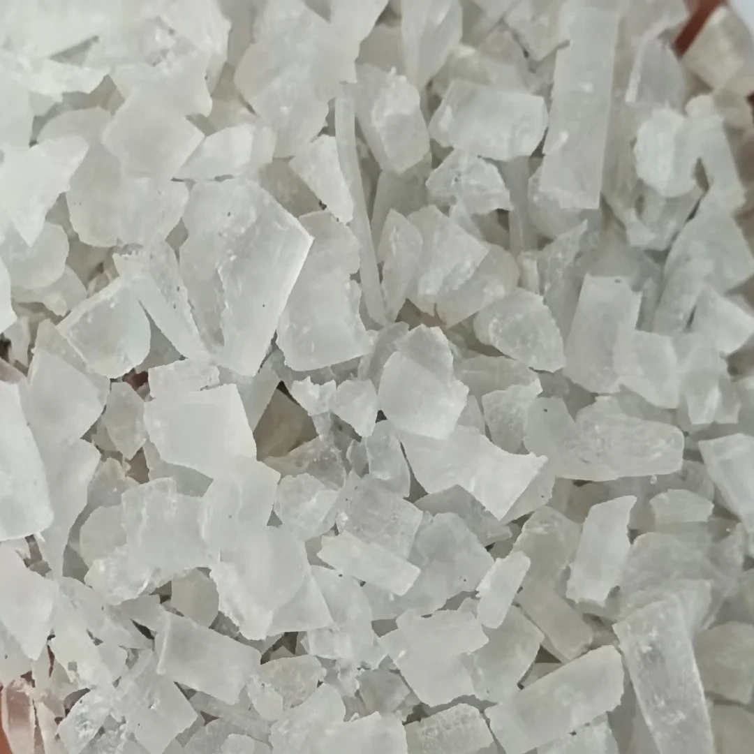 Close-up of white crystalline PP granules showing material texture