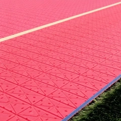 Patterned shock pad installed beneath artificial turf system