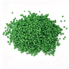 Close-up of colored TPE infill granules showing surface texture
