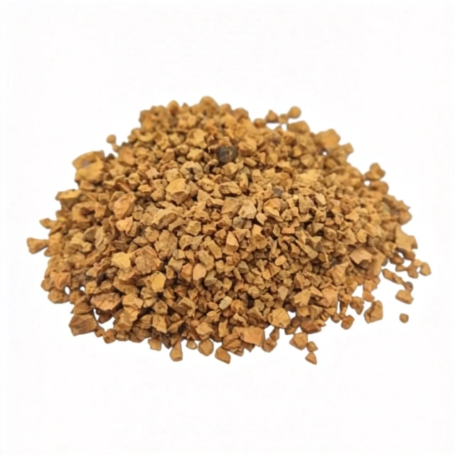 Close-up of natural cork infill granules for artificial turf