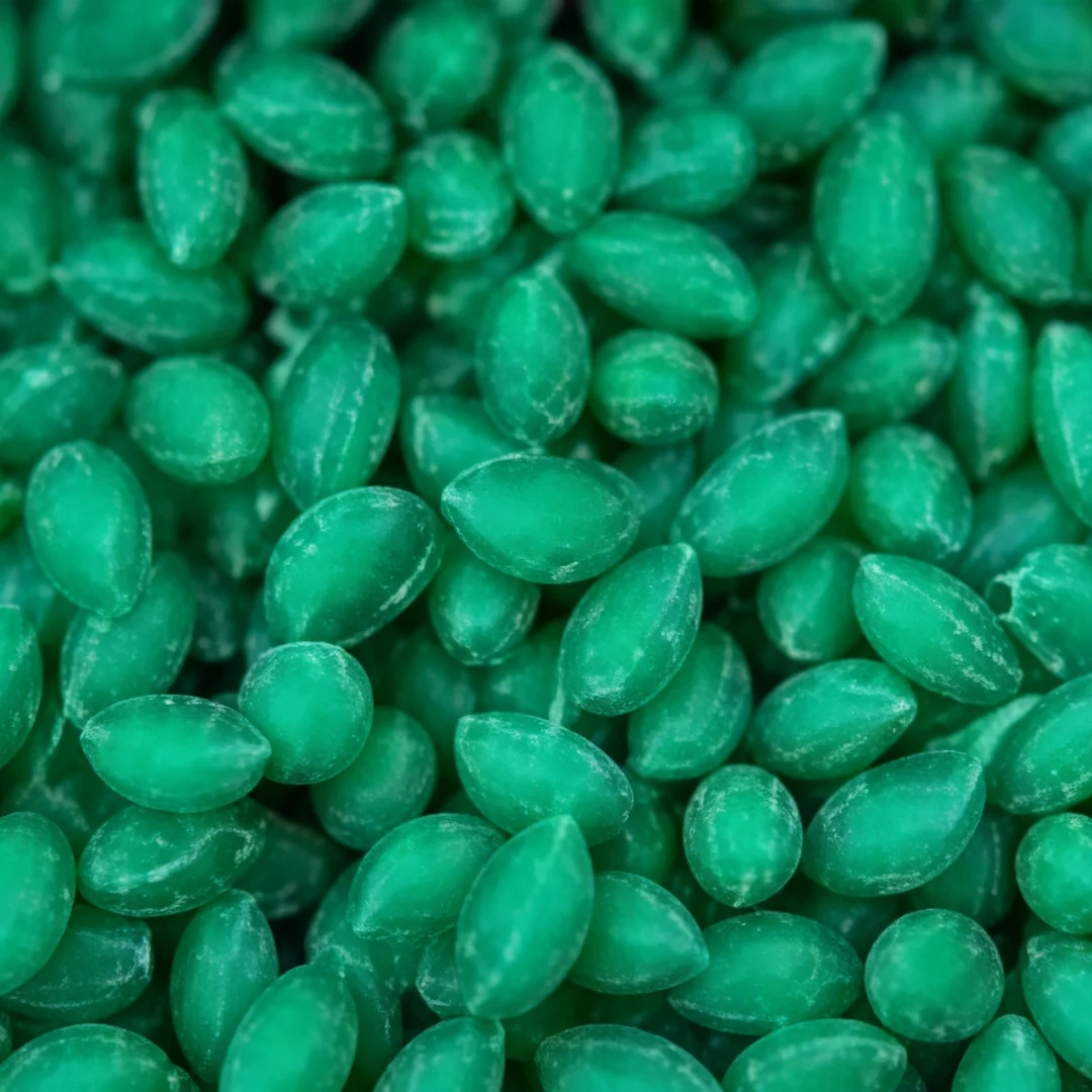 TPV Rubber Granules T11 close-up showing thermoplastic vulcanizate granules for sports and playground surfacing.